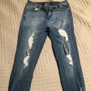 Distressed ankle length jeans